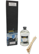 Nutmeg, Orange & Cinnamon 100ml scented artisan reed diffuser. Made with natural, alcohol plant-based reed liquid with no parabens, in a seasonal gift box illustrated with cottage and owl in a snowy night time scene