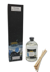 Nutmeg, Orange & Cinnamon 100ml scented artisan reed diffuser. Made with natural, alcohol plant-based reed liquid with no parabens, in a seasonal gift box illustrated with cottage and owl in a snowy night time scene