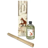Orange & Neroli scented Christmas reed diffuser in a gift box illustrated with a fox in a seasonal, snowy forest scene.
