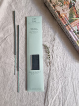 Lime, basil and mandarin artisan incense sticks displayed next to their pastel heritage card pack, showcasing the handmade British finish.