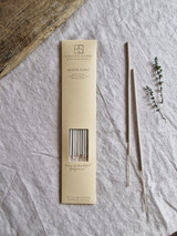 Winter scent artisan incense sticks displayed next to their pastel heritage card pack, showcasing the handmade British finish.