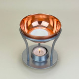 Heaven Scent’s copper effect and pewter finish burner is the perfect vessel for releasing the aroma of our Lime, Basil & Mandarinwax melts.
