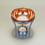 Heaven Scent’s copper effect and pewter finish burner is the perfect vessel for releasing the aroma of our Gold, Frankincense & Myrrh wax melts.