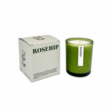 20cl natural soy wax Rosehip scented candle in a beautiful green glass jar, next to its recycled presentation box.