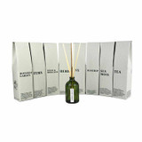 Heaven Scent Tea scented reed diffuser set, including the green glass bottle, rattan sticks, and a recycled gift box.