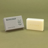 Rosehip 100g Green Botanical natural soap bar shown with its recycled card box packaging featuring a botanical rosehip illustration and the stamped soap bar.