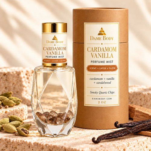 Cardamom Vanilla Perfume, 2 oz, with clear liquid, smoky quartz chips, gold cap and matching bronze-brushstroke kraft tube, styled with cardamom, vanilla and sandalwood.