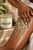 Juniper Aloe Polishing Body Scrub exfoliating damp skin