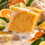 Dame Body Citrus Agave Soap Bar in kraft square-window box with unboxed golden botanical cleansing bar