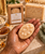 Dame Body 2.5 oz Mini Soap Bar shown in hand for compact travel-friendly scale