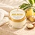 Pineapple Ginger Body Butter beside a towel and cream scoop, representing the rich moisture choice in the Dame Glowing Skin Method.