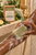 Serenity Green Tea Soap Bar creating creamy lather on wet deep brown skin