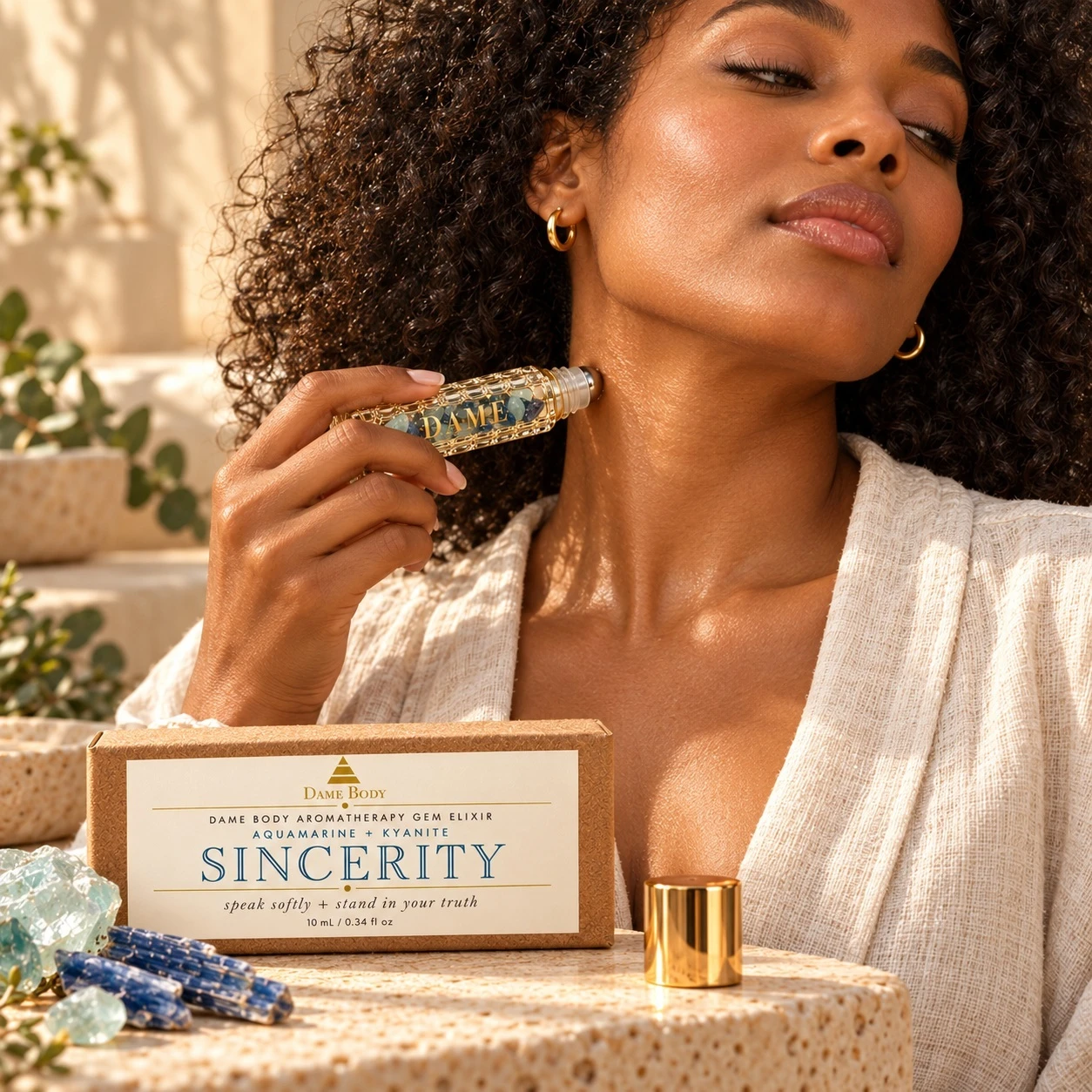 Applying the Sincerity crystal roller to the side of the neck