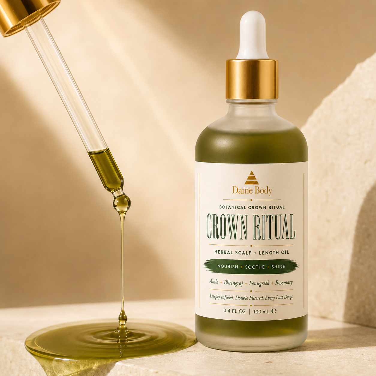 Smooth dark olive Crown Ritual oil flowing from a gold-collared glass dropper beside the labeled bottle.