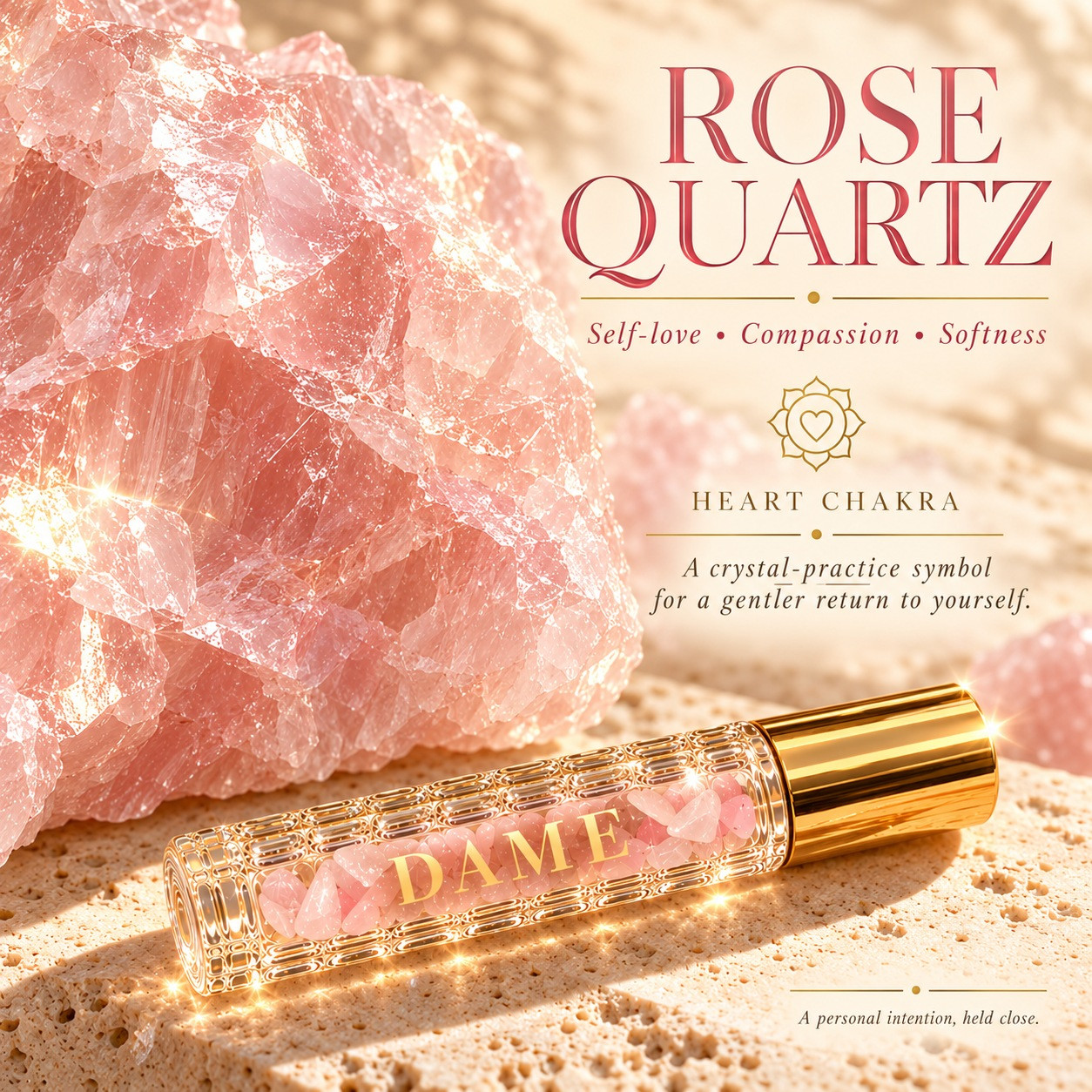 Large raw Rose Quartz beside the clear Dame Nectar roller; self-love, compassion and softness intention.