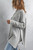 This high neck, oversized, batwing sweater makes every lady look good. With a flattering style, this sweater pairs great with your favorite jeans or leggings. Add a long necklace to dress it up and you are good for date night! Oversized fit when you order your normal size.