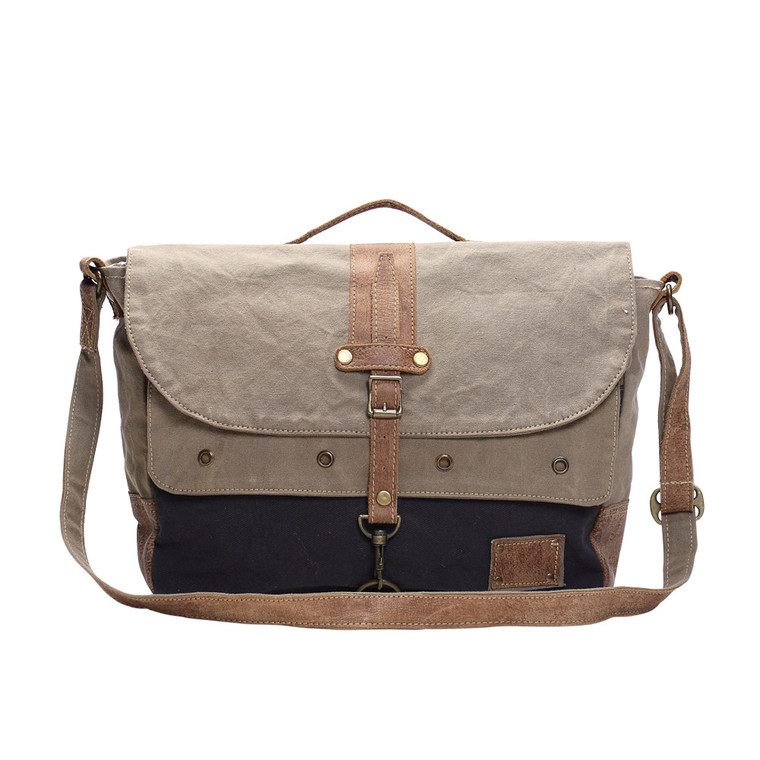 This messenger bag is praised for both men and women for its classic look. Truly a multifunctional upcycled canvas and leather messenger bag having a flapover covered and adjustable shoulder strap.