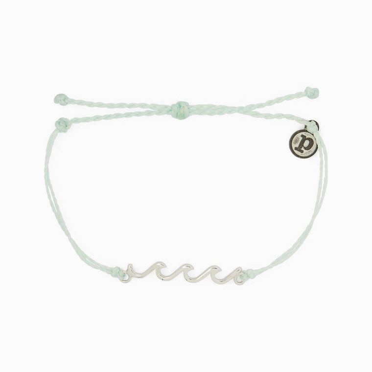 Wanna add another style to your Wave collection? Our new Delicate Wave Bracelet is the perfect piece to pick up if you’re looking for a dainty design. Set on a simple string band with a low-profile silver wave charm.