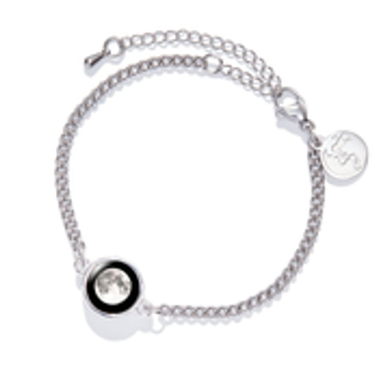 Our Moonglow bracelet combines an awe-inspiring moon phase charm with the classic simplicity of a beautiful silver chain bracelet. Crafted in satainless steel each bracelet is unique to the wearer. Simply select any special day, whether it’s your birthday, the day you tied the knot, or landed that well-earned promotion––every meaningful milestone deserves to be celebrated!

Like the moon itself, our lunar charms catch the rays of the sun by day to illuminate in darkness––creating a soft soulful glow that will surely be a conversation starter. 

** The MOON PHASE CODE you will choose when you add to cart will be listed under the picture of the moon in the YOUR RESULTS area after you enter your date in the Moon Phase Calculator. 

** The Moon Phase that is shown in picture with your moon phase code is the moon that will be on your bracelet. Each bracelet will come with a card explaining the characteristics for your moon as listed on the results page.




10mm silver-plated charm
10mm mini moon phase image
6 1/2" - 7 1/2" adjustable stainless steel bracelet  
Stainless steel Moonglow logo tag