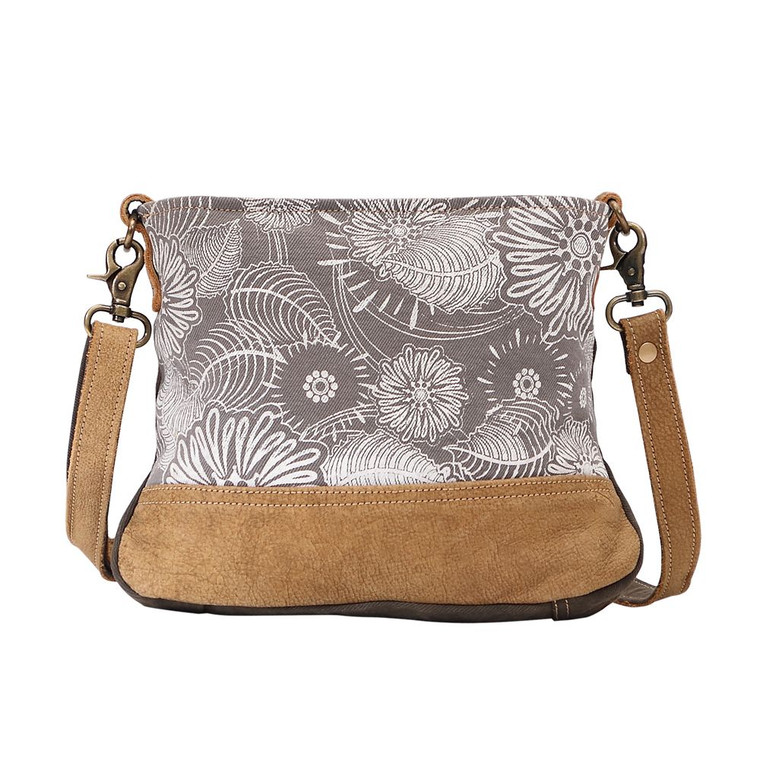 This small & cross body bag has chic fashion flower design with hairon at the front bottom! Comes with zippered top closure to secures items inside. This upcycled canvas and leather bag is bound to become a favorite as because of its stylish look and perfect size.