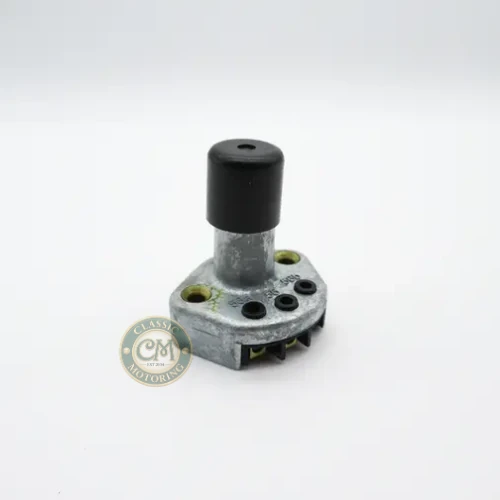 Floor-mounted headlamp dip switch for MGB, part 502087, round push-button type with screw terminals.