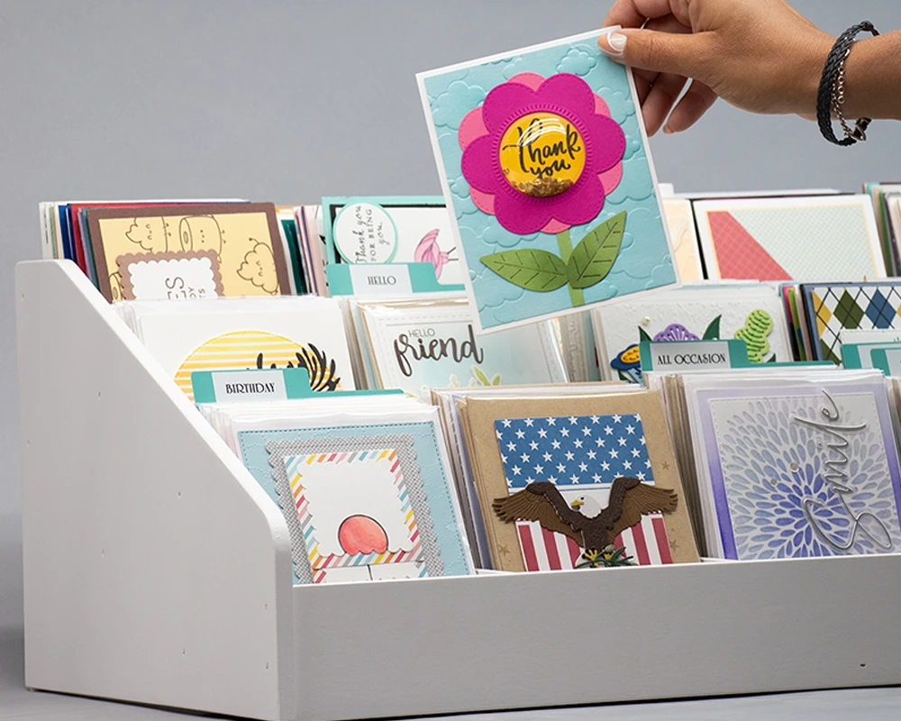Thank You flower shaker card being picked out of several cards in a Stamp-n-Storage Multi-Level Card Holder