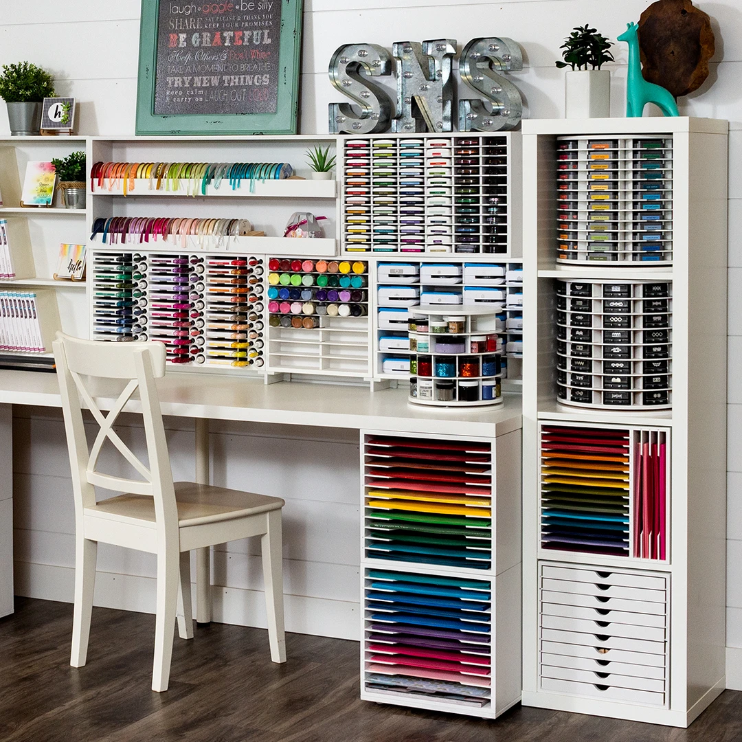 A beautifully organized creative workspace with carousel storage