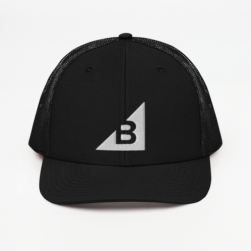 B Mark Trucker Hat left front view on a model.