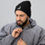 Black B Mark Logo Beanie, front view on a model.