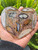 Decorative heart made from natural banded agate slices set in resin displayed upright in metal stand Decorative Valentines Day Gift