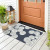 Navy Sand Dollar Scattered Shells Rug front door