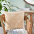 Seaside Shells Tan and Cream Cottage Pillow on chair Seaside Shells Tan and Cream Cottage Pillow on chair