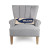 Welcome Whale Oblong Wool Hooked Pillow on chair