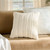 Seaside Haven III Ivory Indoor Throw Pillow on sofa