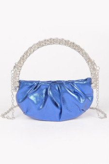 A structured iridescent blue handbag featuring a unique wide-arched top handle and a matching detachable crossbody strap.