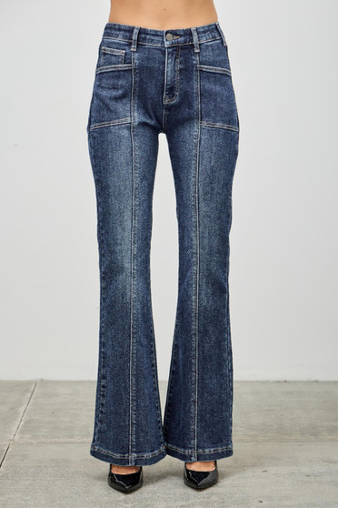 Front view of high-rise flare jeans in dark indigo with front patch pockets and center seams.