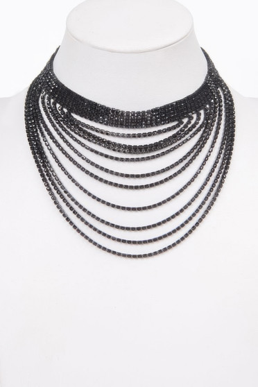 A multi-strand bib necklace featuring several cascading rows of dark, shimmering stones draped in a tiered waterfall design on a white jewelry bust.