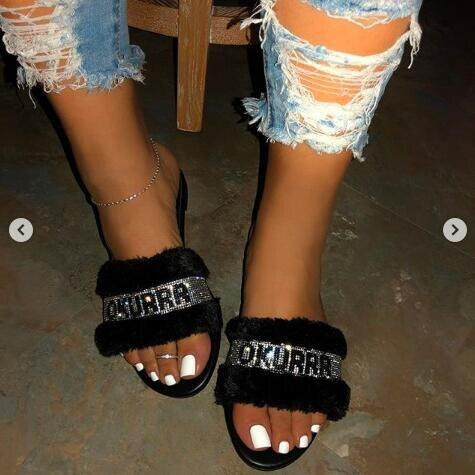 black faux fur slides