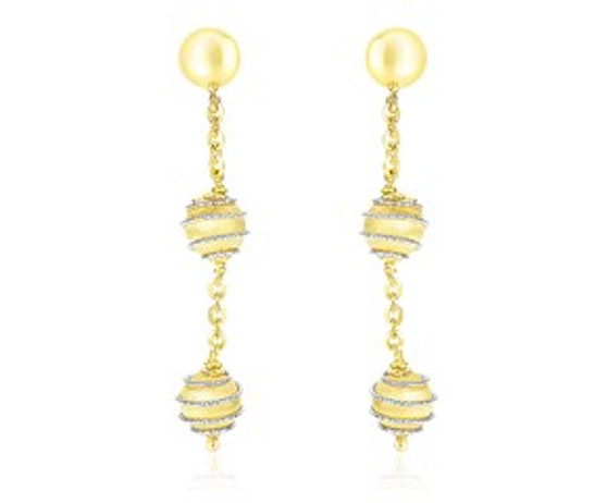 Beautiful in 14k two-tone gold, these earrings showcase two layers of coil wrapped balls and dainty chains. Secured with push backs