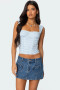 Wide-set straps and dainty lace trim on a retro-inspired polka dot bustier.