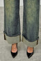 Distressed wide leg jeans with dramatic cuff