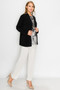 Mid-hip length open-front cardigan in stretch jersey fabric.
