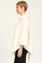 Cream off-white knit poncho for women, textured bouclé winter wrap, funnel neck sweater cape.