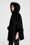 "Black hooded cape coat with faux fur trim, women's elegant winter poncho, designer style wool wrap outerwear."