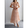 Elegant midi dress for garden parties and outdoor weddings.