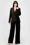 "High-waisted wide-leg trousers and tailored blazer ensemble in black."