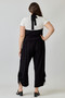 Modern plus-size fashion: black wide-leg jumpsuit for summer or layering.