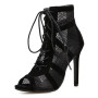Black mesh and suede lace-up stiletto booties with a corset front and open toe.