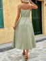 Muted olive green summer dress with pleated bodice and beads.