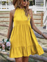 Marigold yellow tiered halter mini dress with a ruffled high neck and flowy babydoll silhouette.